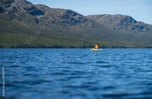 Kayak on a large lake in a scandinavian wilderness. Ottsjon, Sweden.