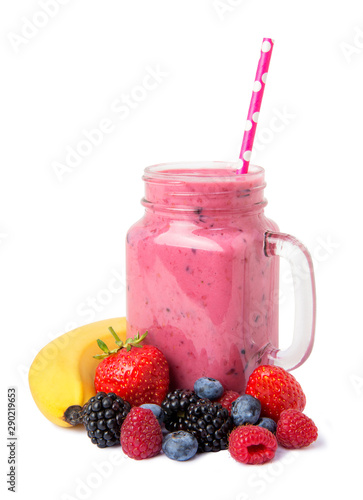 Berry mix smoothie with banana and fresh ingredients in a glass jar on a white background