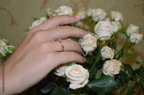 bride hand and flowers