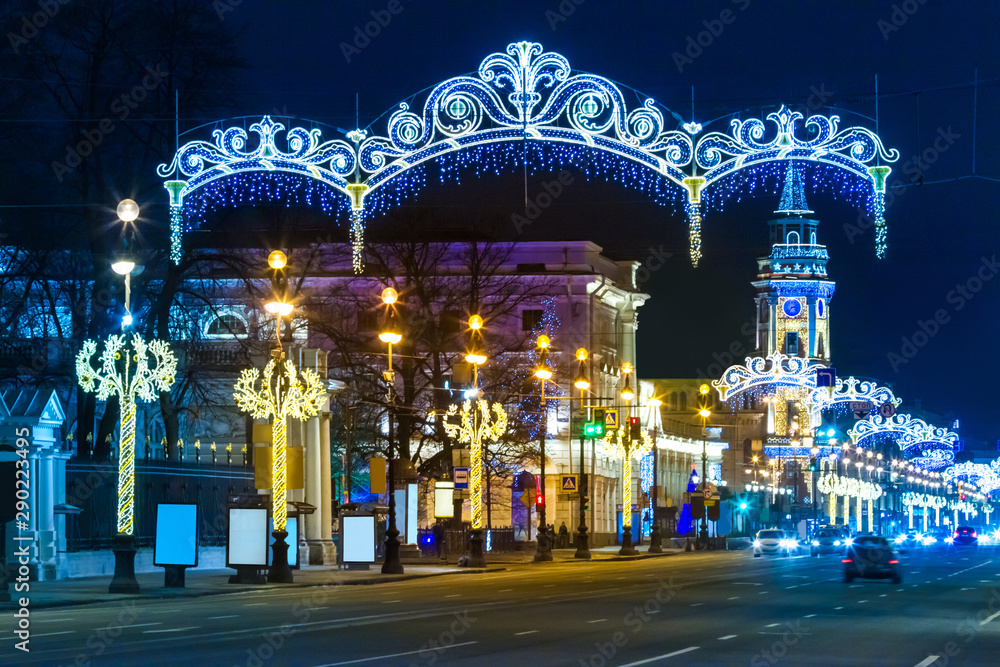 Russia. Saint-Petersburg. Nevsky prospect is decorated for Christmas. New year in Russia. Christmas decorations of St. Petersburg. Festive evening in the city. Luminous garland.