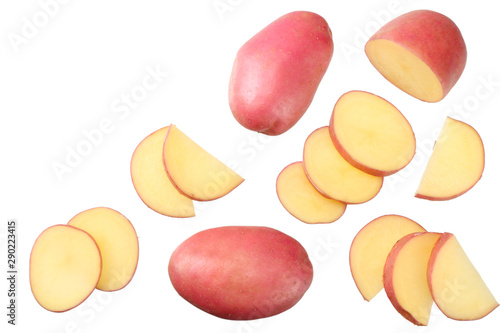 Raw red potato with slices isolated on white background. top view