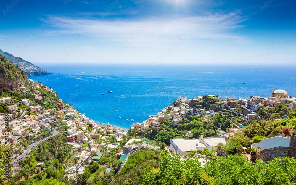 Panoramic aerial view of beautiful Positano with comfortable beaches and clear blue sea on Amalfi Coast in Campania, Italy.