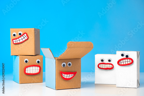 Cardboard boxes with faces....