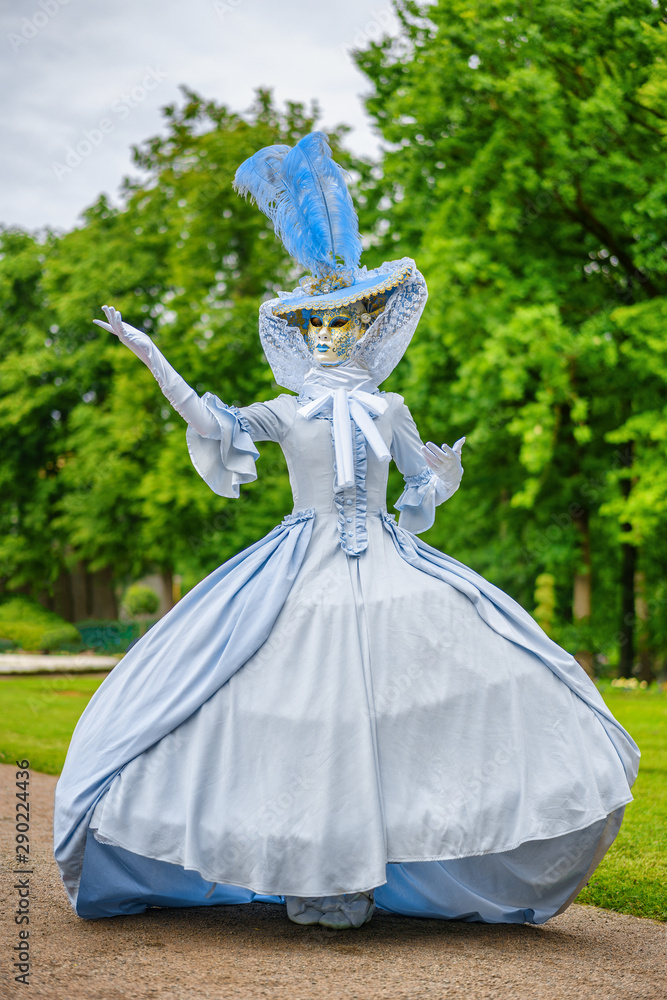 masquerade ball a woman in a beautiful dress and Venetian mask Stock Photo Adobe Stock