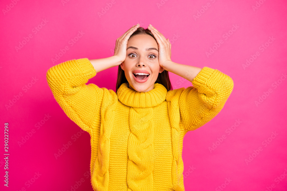 Portrait of amazed person touching her head screaming wearing knitted pullover isolated over pink background Portrait of amazed person touching her head screaming wearing knitted pullover isolated over pink background