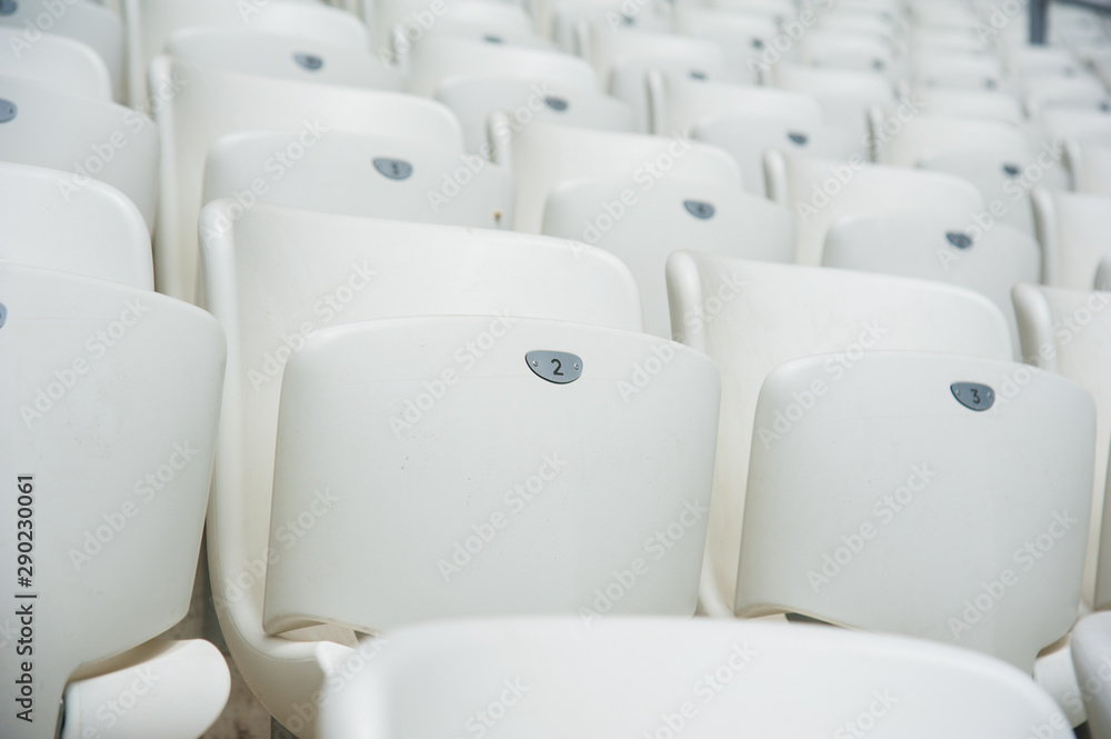 Fototapeta premium Empty white seats in stadium