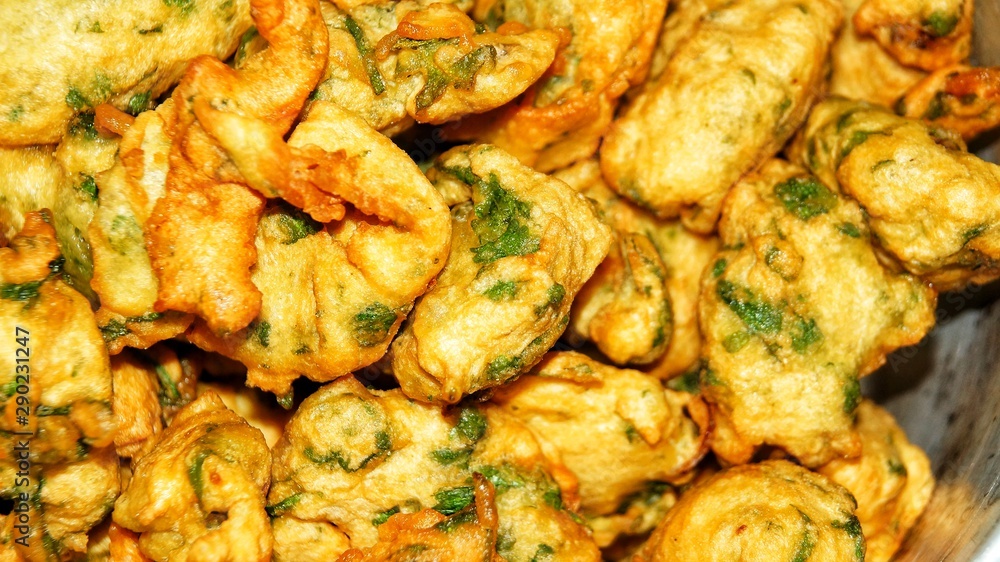 Vegetables fritters / Cucur sayur are vegetable fritters which are commonly sold by Malay street vendors in Malaysia and Singapore Vegetables fritters / Cucur sayur are vegetable fritters which are commonly sold by Malay street vendors in Malaysia and Singapore