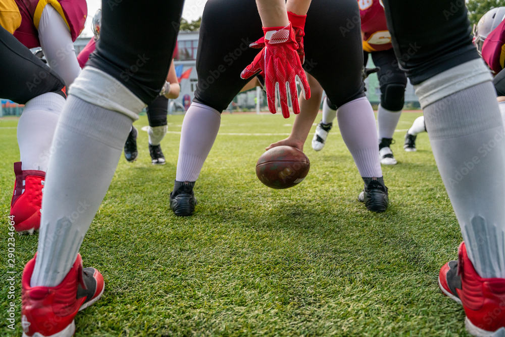 Photo of athletes playing american football on sports field Photo of athletes playing american football on sports field