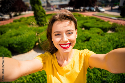 Self-portrait of her she nice attractive lovely charming pretty cheerful cheery shine girl spending free time springtime on fresh air natural park country outdoors #290234604