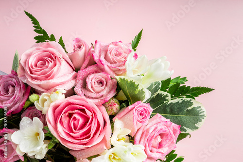 Beautiful and tender bouquet of flowers in the hat box 