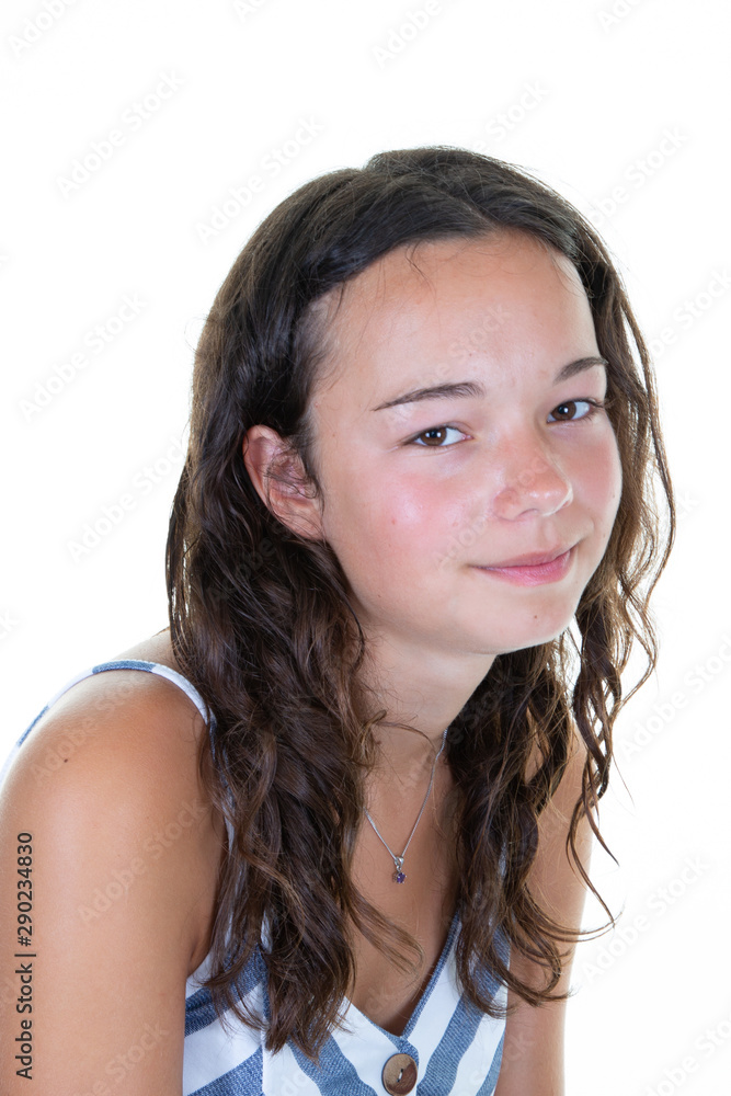 young hispanic girl teen posing looking at camera over white background young hispanic girl teen posing looking at camera over white background