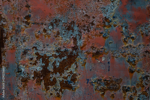 A metal wall corroded by rust. Abstract background.