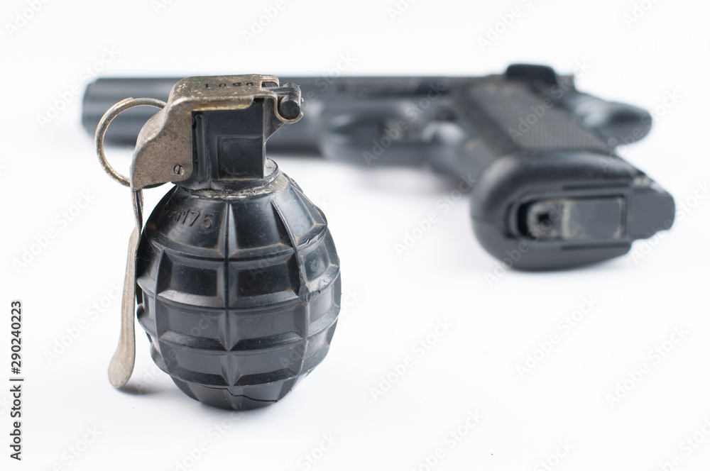 Fototapeta premium Gun and bomb isolated on white background.Pistol isolated