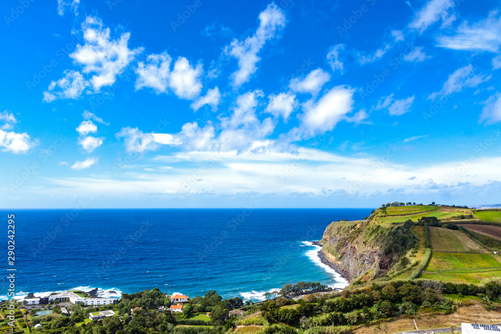 Picturesque panoramic view of South coast of Sao Miguel island near Ague de Pau village, Azores, Portugal Picturesque panoramic view of South coast of Sao Miguel island near Ague de Pau village, Azores, Portugal