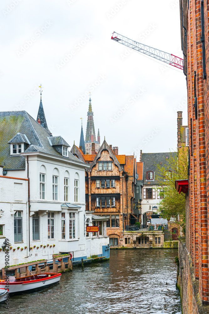 Fototapeta premium BRUGES, BELGIUM - April 13, 2018: Street view of downtown in Bruges, Belgium