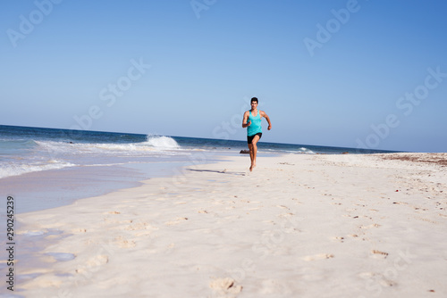 Long distance shot of a fit young man running