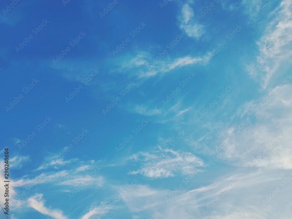 Fototapeta premium The blue sky with white clouds floating on space. 