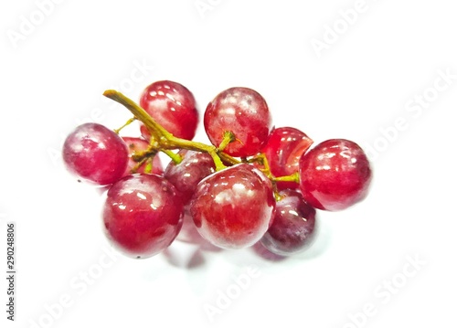 Red grapes on a white background 