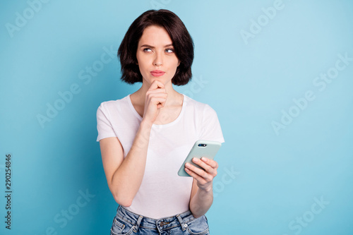 Portrait of her she nice attractive creative minded girl creating media plan internet online followers subscribe isolated on bright vivid shine vibrant blue turquoise color background photo