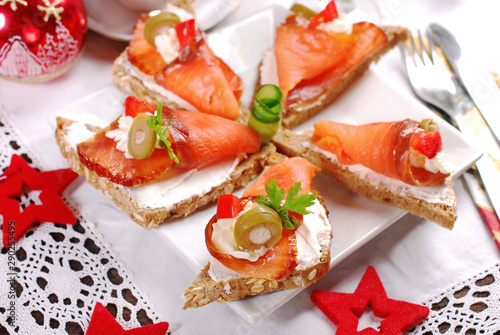 christmas canapes with salmon and cheese top view