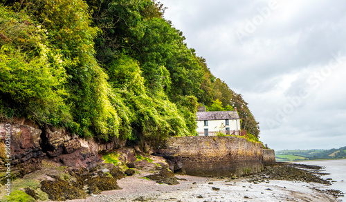 View of Dylan Thomas Georgian Boathouse in Laugharne, South Wales where he wrote the play 'Under Milk Wood'. 