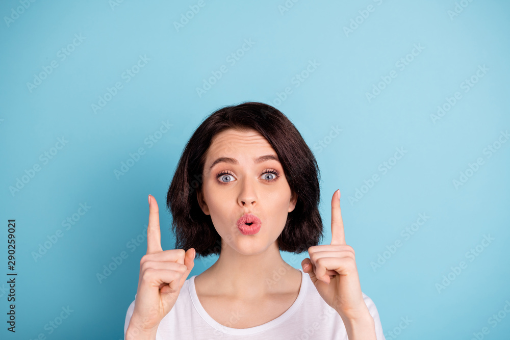 Close-up portrait of her she nice attractive lovely cheerful amazed girl pout lips pointing two forefingers up advert isolated on bright vivid shine vibrant blue turquoise color background Close-up portrait of her she nice attractive lovely cheerful amazed girl pout lips pointing two forefingers up advert isolated on bright vivid shine vibrant blue turquoise color background