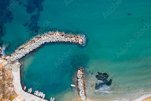 Agios Romanos, Tinos/Greece - September 10th 2019: Aerial view of the beach during sunset © camerarules