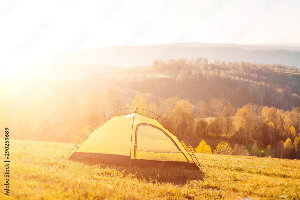 tent on the nature. bright sunny day. people on vacation, outdoor activities