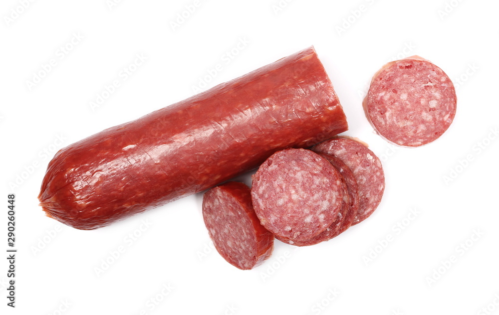 Fermented semi-dry, smoked sausage salami slices isolated on white background, top view Fermented semi-dry, smoked sausage salami slices isolated on white background, top view