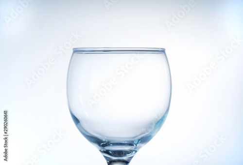 Empty wine glass on a white background, isolated, close up