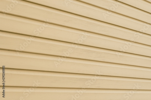 Wallpaper Mural Light yellow (white) vinyl wood siding panel background with simulated wood texture. Torontodigital.ca