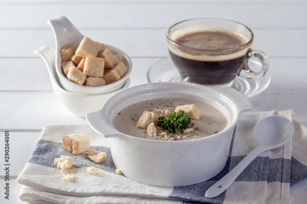 Creamy chicken and vegetables on a white wooden table Creamy chicken and vegetables on a white wooden table