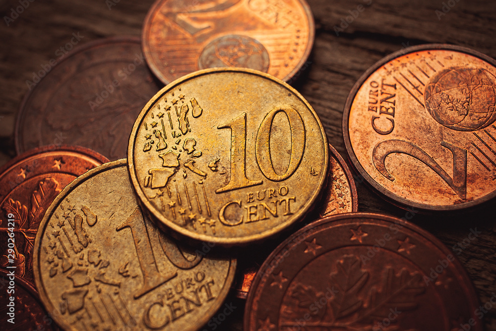 euro coins on wood background - european money euro coins on wood background - european money