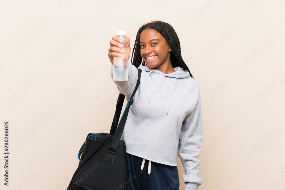 African American sport teenager girl with long braided hair African American sport teenager girl with long braided hair