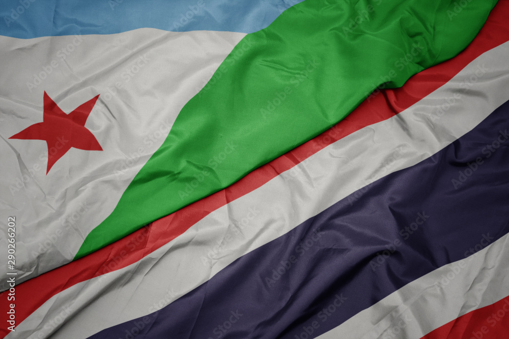 waving colorful flag of thailand and national flag of djibouti.