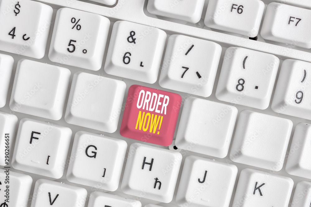Word writing text Order Now. Business photo showcasing confirmed request by one party to another to buy sell White pc keyboard with empty note paper above white background key copy space Word writing text Order Now. Business photo showcasing confirmed request by one party to another to buy sell White pc keyboard with empty note paper above white background key copy space