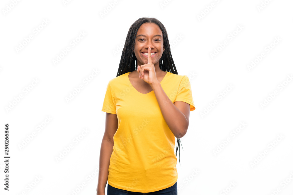 African American teenager girl with long braided hair over isolated white background doing silence gesture African American teenager girl with long braided hair over isolated white background doing silence gesture