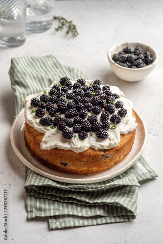 Fresh cakes with blackberries and cream cheese