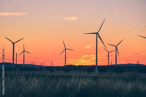 Sunset with windmill  wind turbine  wind generator