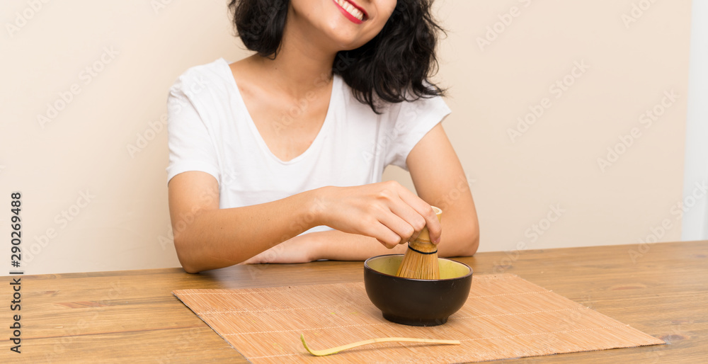 Young asian girl with tea matcha Young asian girl with tea matcha