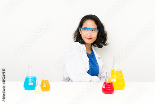 Young scientific asian girl laughing