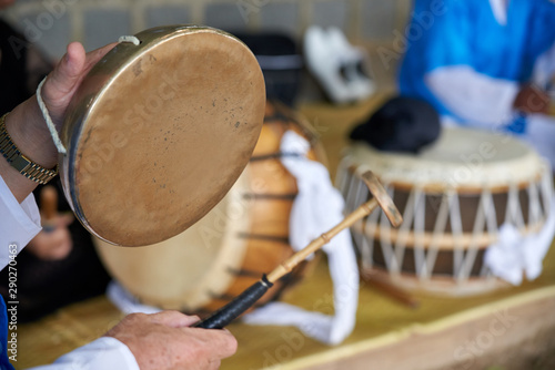 A person who plays samulnori, a traditional Korean music