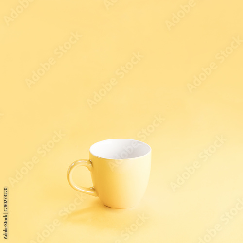 Still life of a yellow mug