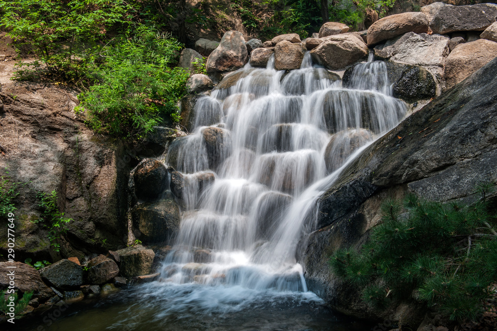 The Xiaoxi waterfall in Panshan, China The Xiaoxi waterfall in Panshan, China