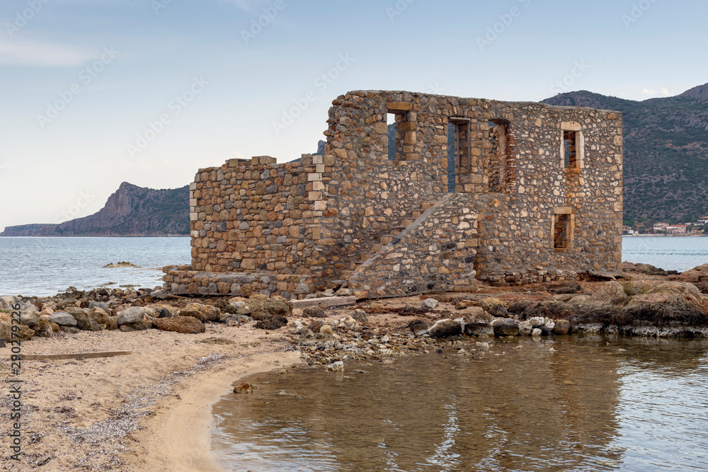 Old, ruined house on the beach (Greece, Peloponnese)