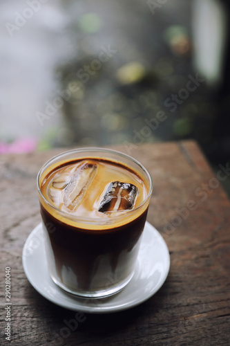 ice latte coffe on wood in coffee shop