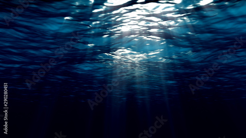 Rays of light passing through the sea surface © alexmu