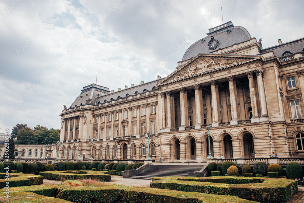 Fototapeta premium Brussels, Belgium Labyrinths of yellowed shrubs, landscape design, landscaping at Royal Palace with majestic facade