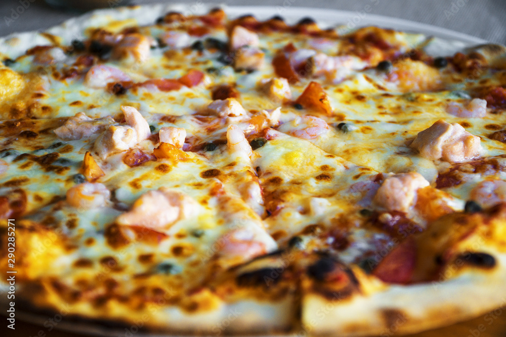 Pizza with seafood. Mozzarella, tuna and shrimps. Pizza with seafood. Mozzarella, tuna and shrimps.