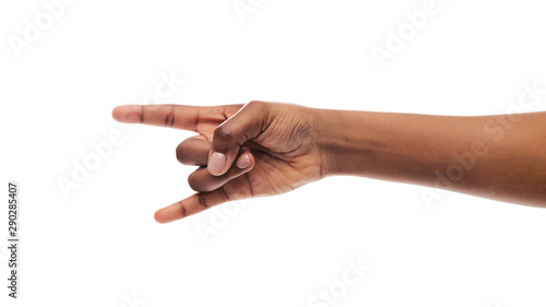 Black female hand making rock'n'roll gesture isolated on white background